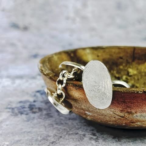 Gemelos Personalizados de Cadena y Huellas